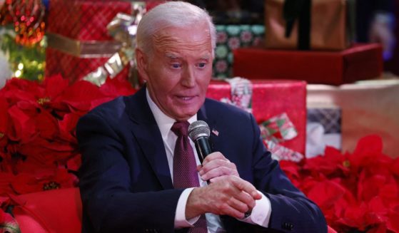 President Joe Biden speaks during a holiday visit to patients and families at Children's National Hospital in Washington, D.C., on Friday.