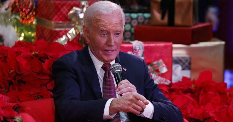 President Joe Biden speaks during a holiday visit to patients and families at Children's National Hospital in Washington, D.C., on Friday.