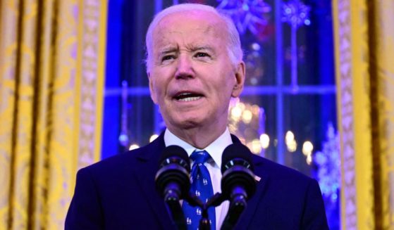 President Joe Biden speaks during a Hanukkah holiday reception in the East Room of the White House in Washington, D.C., on Monday.