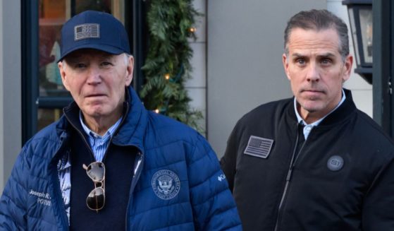 President Joe Biden and son Hunter Biden stepping out of a bookstore while shopping in Nantucket, Massachusetts on November 29, 2024.