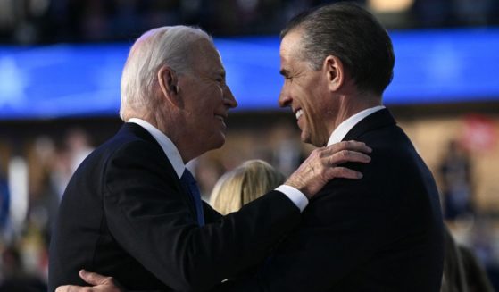 President Joe Biden, left, embraces his son, Hunter Biden, at the conclusion of the first day of the Democratic National Convention in Chicago, Illinois, on Aug. 19.