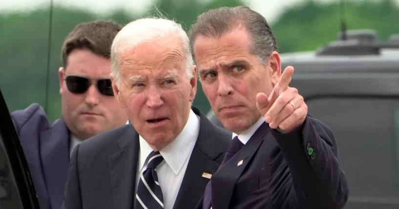 President Joe Biden, left, and son Hunter Biden, right, arrive at Delaware Air National Guard Base in New Castle, Delaware, on June 11.