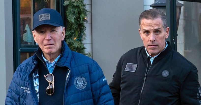 President Joe Biden, left, and his son, Hunter Biden, right, leave a book store as they walk in downtown Nantucket, Massachusetts, on Friday.