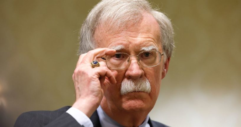 Former National Security Adviser John Bolton speaks to reporters after speaking in a panel in Washington, D.C., on Aug. 17, 2022.