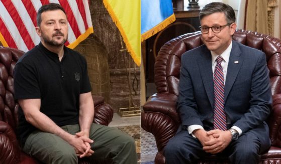 Ukrainian President Volodymyr Zelenskyy, left, meets with Speaker of the House Mike Johnson, right, at the U.S. Capitol in Washington, D.C., on July 10.