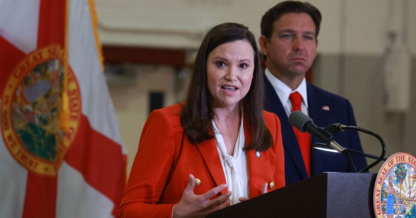 Florida Gov. Ron DeSantis, right, and Florida Attorney General Ashley Moody, seen at a September news conference, both criticized the federal government's actions in investigating a Sept. 17 assassination attempt against former President Donald Trump while he was golfing at Trump International Golf Club.