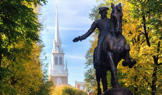 A statue of Paul Revere sits in front of the Old North Church in Boston, Massachusetts.