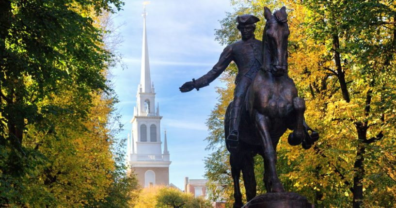 A statue of Paul Revere sits in front of the Old North Church in Boston, Massachusetts.