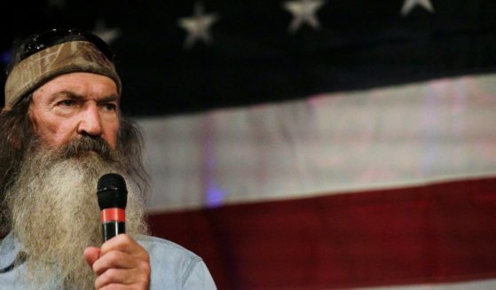 Phil Robertson of "Duck Dynasty" is seen speaking at a 2017 political rally. His family reported Robertson received a "reprieve" from his recent health challenges after Christians worldwide began praying for him.