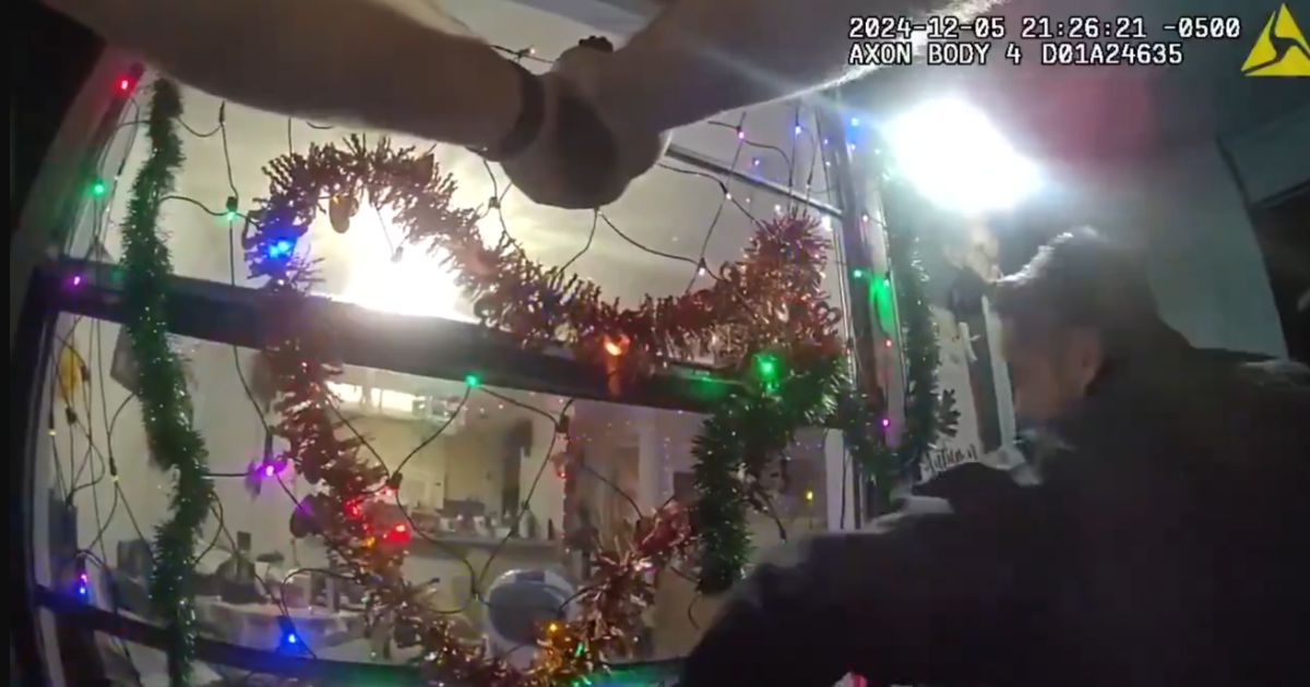 Watch Manliest Cop Ever: Shatters Glass With Bare Hands, Launches Through Window to Save Woman Held at Knifepoint