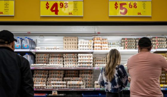 Customers shop for eggs at a H-E-B grocery store on February 08, 2023 in Austin, Texas.