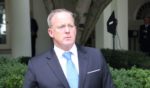 Former White House press secretary Sean Spicer listens as US President Donald Trump holds a news conference with Prime Minister of Lebanon Saad Hariri, in the Rose Garden at the White House on July 25, 2017 in Washington,DC.