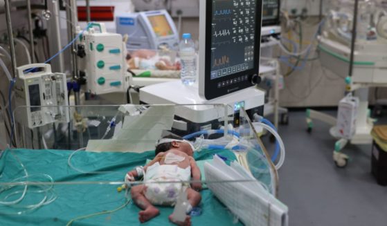 This picture taken on September 29, 2022 shows a view of a newborn infant receiving care at a neonatal intensive care unit (NICU) at al-Shifa hospital in Gaza City on September 29, 2022.