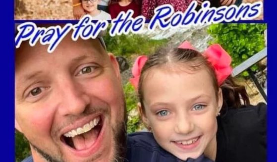 A picture of Will Robinson, a father who died in a flood, and his missing daughter.