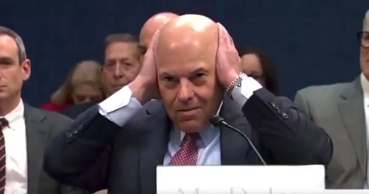 Video: Postmaster General Claps Hands Over Ears When Congressman Hits Him with Hard Questions