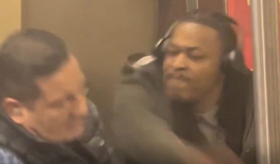 On Nov. 25, Alexander Rakitin, left, was riding the New York City subway to work when he was allegedly attacked by Timothy Barbee, right, but others on the train came to the defense of Barbee.