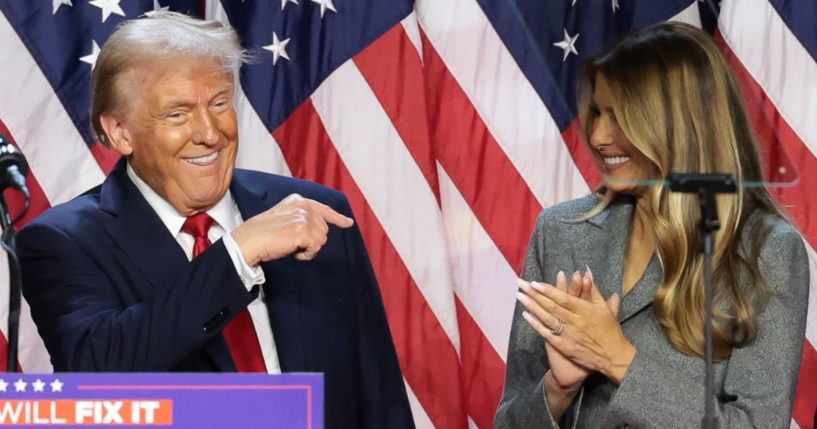 President-elect Donald Trump, left, points to former and future first lady Melania Trump while speaking at an election night event in Palm Beach, Florida, on Nov. 6.