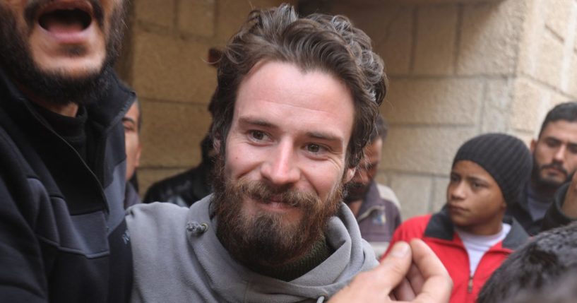 Travis Timmerman, a US citizen who had entered Syria from Lebanon on a Christian pilgrimage and had been detained for several months, speaks with reporters in a house in Damascus on December 12, 2024.