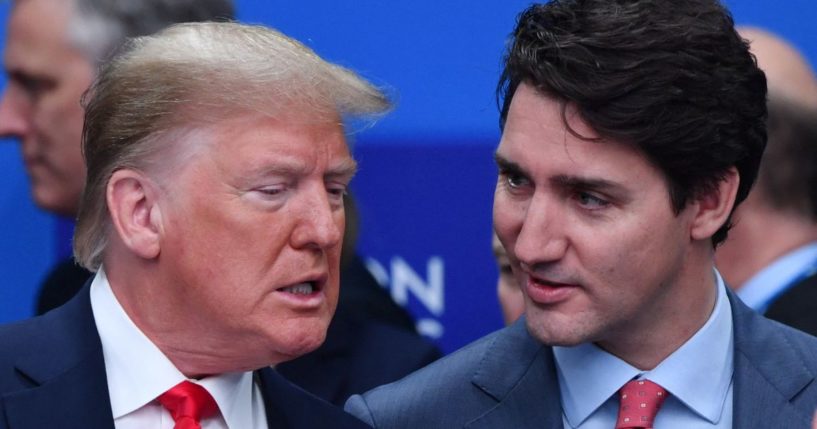 Then-President Donald Trump, left, and Canadian Prime Minister Justin Trudeau, right, are pictured during the plenary session of the NATO summit in London, England, on Dec. 4, 2019.