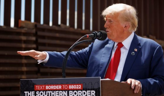 Then-Republican presidential candidate Donald Trump speaks to journalists at the U.S.-Mexico border in Montezuma Pass, Arizona, on Aug. 22.