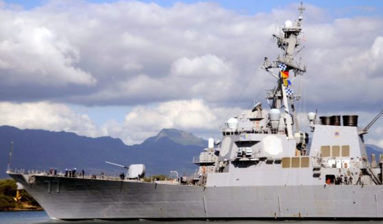 The guided-missile destroyer USS O'Kane (DDG 77) makes its way out of Pearl Harbor in Honolulu, Hawaii, on Feb. 27, 2010.