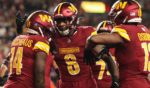 Players on the Washington Commanders celebrate after scoring a touchdown in their game against the Atlanta Falcons in Landover, Maryland, on Sunday.