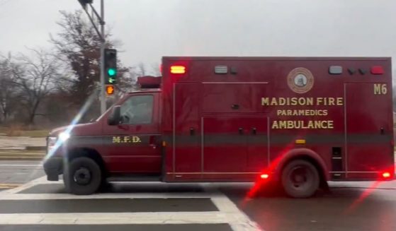 This X screen shot shows a Madison, Wisconsin, ambulance rushing towards Abundant Life Christian School after a school shooting on Dec. 16.