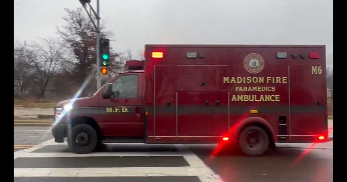 This X screen shot shows a Madison, Wisconsin, ambulance rushing towards Abundant Life Christian School after a school shooting on Dec. 16.