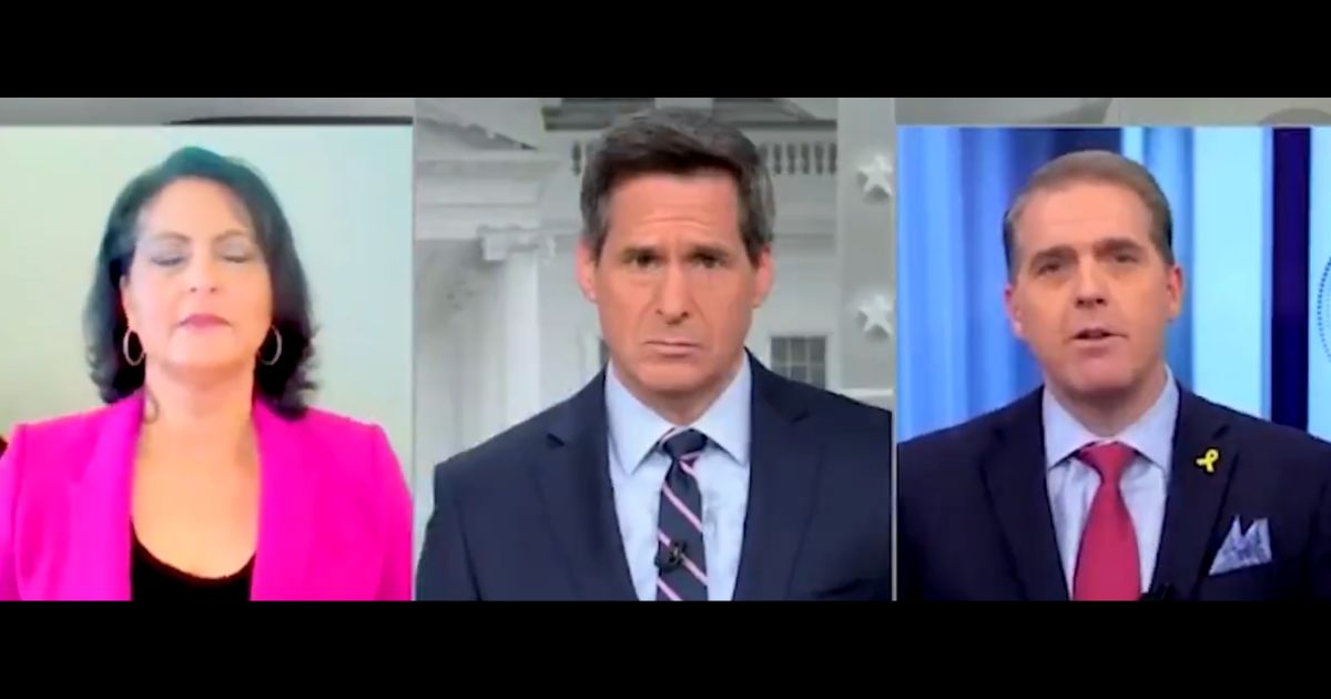 This X screen shot shows a discussion on a CNN panel involving John Brennan (C), Karen Finney (L) and Scott Jennings (R).