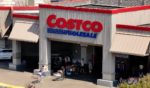 In an aerial view, the Costco logo is displayed on the exterior of a Costco store on July 11, 2024 in Richmond, California.