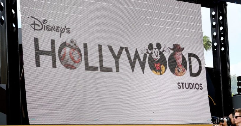 Members of the media and guests observe the new Disney's Hollywood Studios logo during Disney's Hollywood Studios 30th Anniversary Celebration at Disney’s Hollywood Studios on May 1, 2019 in Orlando, Florida.