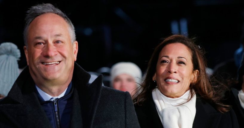 Vice President Kamala Harris (C) and Second Gentleman Douglas Emhoff (L) attend the 102nd National Christmas Tree Lighting Ceremony on the Ellipse on December 5, 2024 in Washington, DC.