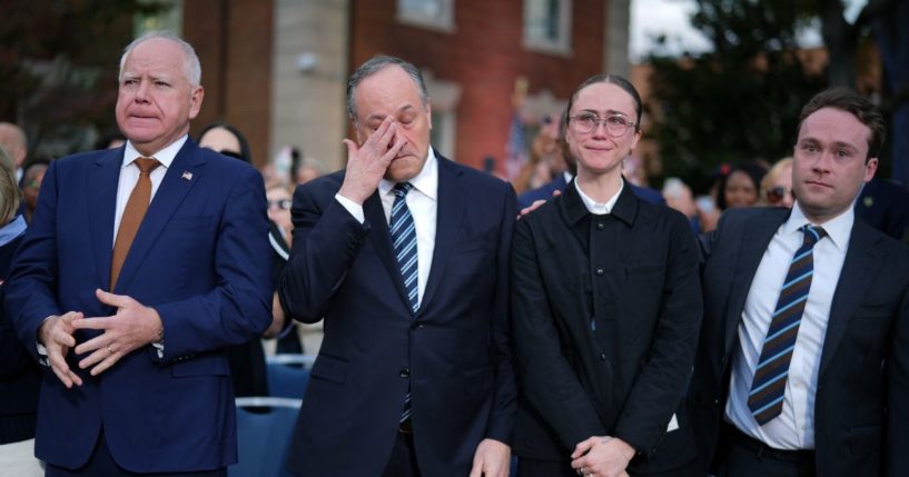 (L-R) Failed Democratic vice presidential nominee, Minnesota Gov. Tim Walz, Second gentleman Doug Emhoff, Ella Emhoff and Cole Emhoff react after Democratic presidential nominee, U.S. Vice President Kamala Harris conceded the election in a speech at Howard University on November 6, 2024 in Washington, DC.