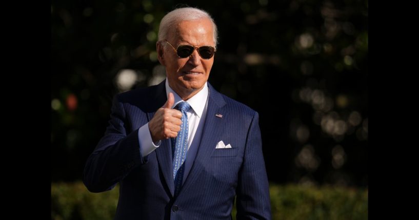 U.S. President Joe Biden motions to the audience after pardoning the National Thanksgiving Turkey Peach during a ceremony on the South Lawn of the White House on November 25, 2024 in Washington, DC.