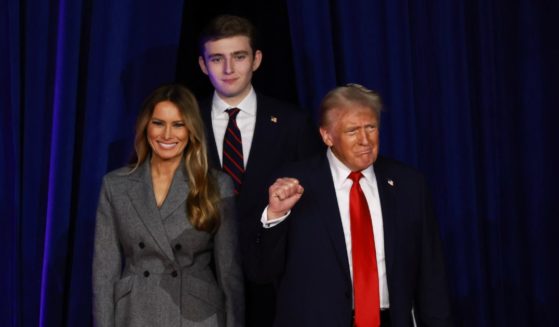 U.S. President-elect Donald Trump arrives to speak with first lady Melania Trump and Barron Trump during an election night event at the Palm Beach Convention Center on November 6, 2024 in West Palm Beach, Florida.