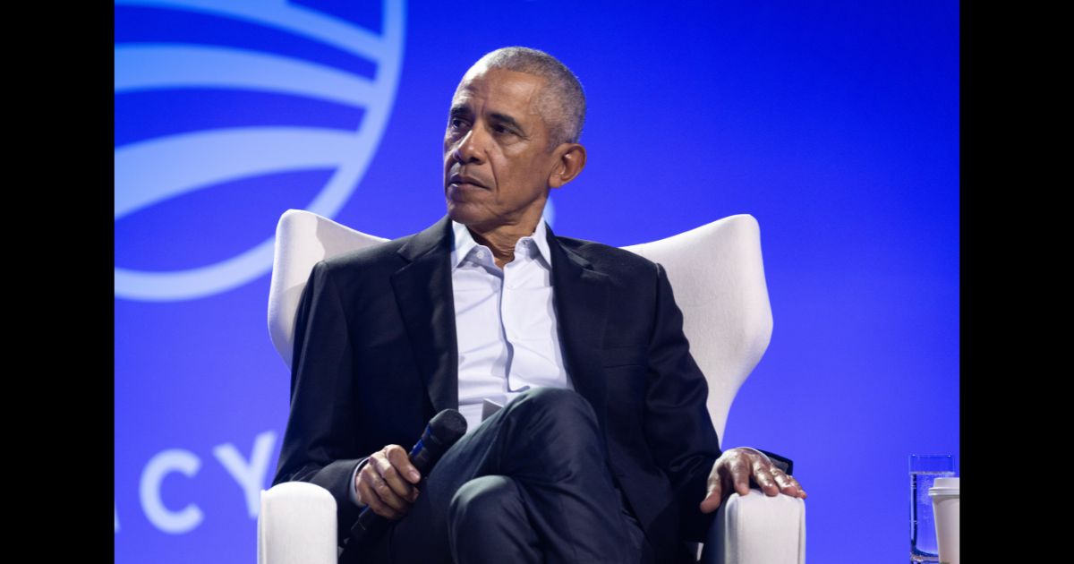 Former President Barack Obama moderates a conversation with Manu Meel, Co-Founder and CEO of BridgeUSA, Ainka Jackson, Founding executive director of the Selma Center for Nonviolence, Truth, and Reconciliation and Nika Kovač, Director of Slovenia-based Institute 8th of March during the Obama Foundation's 2024 Democracy Forum on December 5, 2024 in Chicago, Illinois.