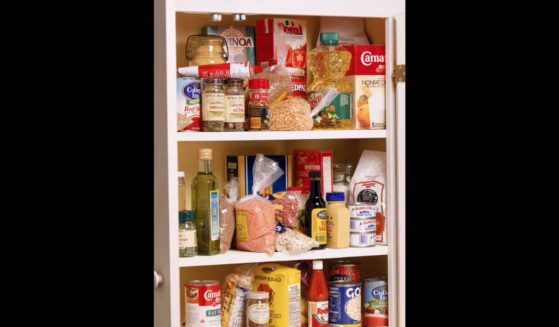 This Getty stock image shows a kitchen pantry with various items in it.