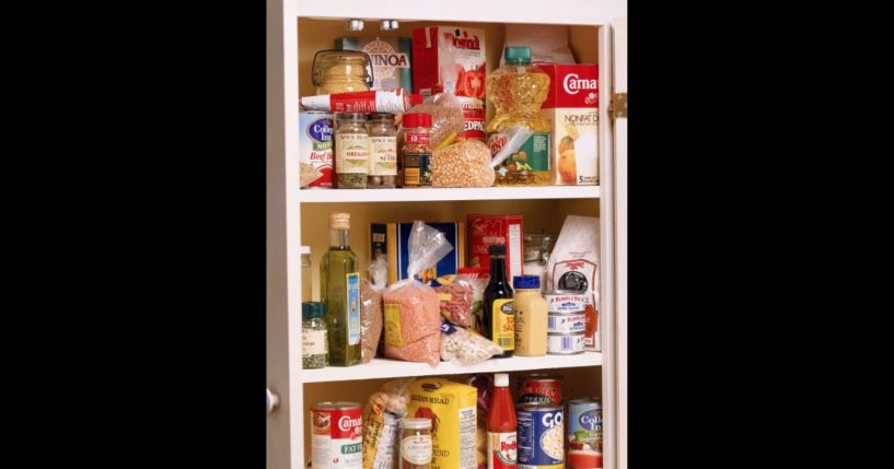 This Getty stock image shows a kitchen pantry with various items in it.