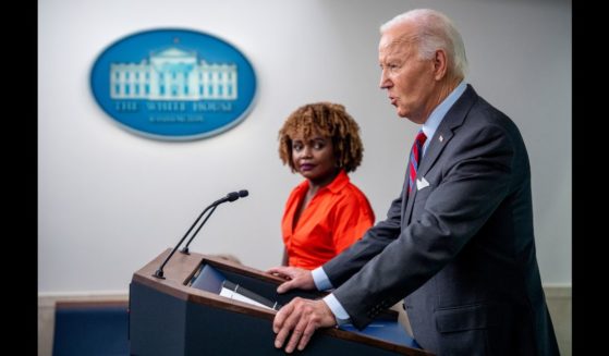 U.S. President Joe Biden, accompanied by White House press secretary Karine Jean-Pierre, speaks during a news conference in the Brady Press Briefing Room at the White House on October 4, 2024 in Washington, DC.