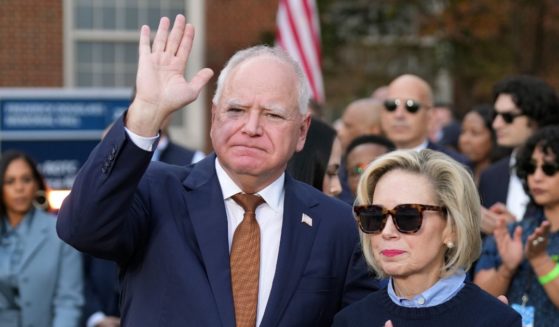 Democratic vice presidential nominee, Minnesota Gov. Tim Walz and Minnesota first lady Gwen Walz react as Democratic presidential nominee, U.S. Vice President Kamala Harris concedes the election in a speech at Howard University on November 6, 2024 in Washington, DC.