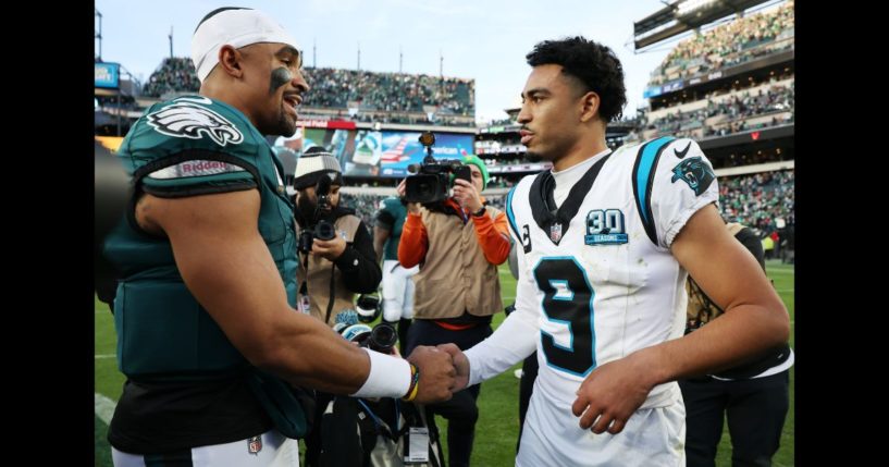 Jalen Hurts #1 of the Philadelphia Eagles talks with Bryce Young #9 of the Carolina Panthers after the Eagles defeated the Panthers, 22-16, at Lincoln Financial Field on December 8, 2024 in Philadelphia, Pennsylvania.