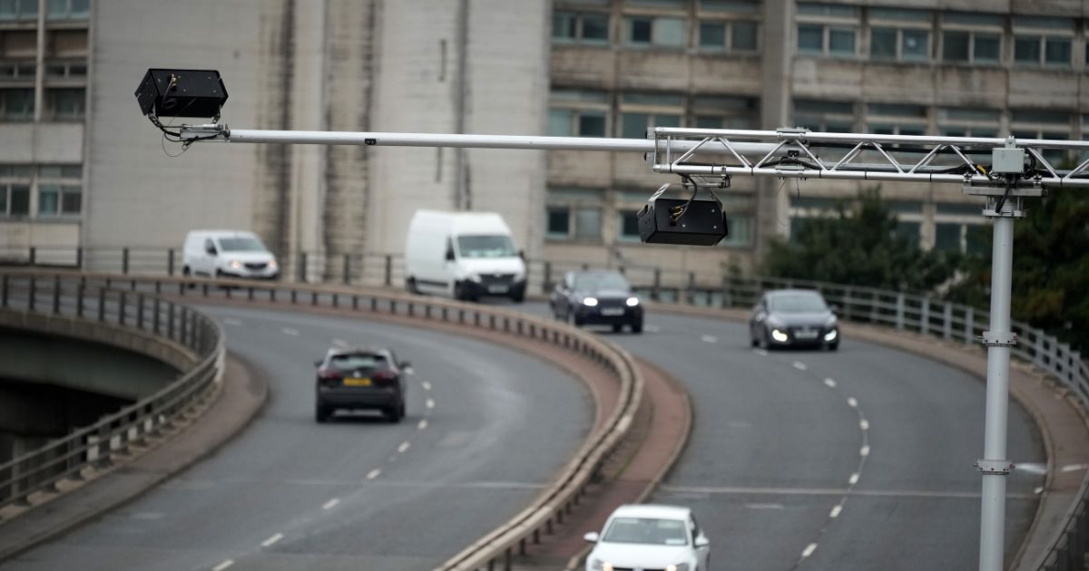 An AI safety camera monitors and records traffic on Mancunian Way in Manchester, England, on Sept. 5.