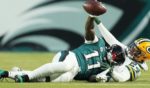 A.J. Brown of the Philadelphia Eagles catches a pass in front of Carrington Valentine of the Green Bay Packers in the first quarter during the NFC Wild Card Playoff in Philadelphia, Pennsylvania, on Sunday.