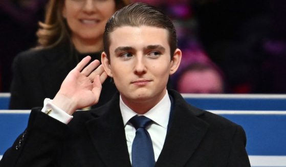 Barron Trump puts his hand to his ear after receiving an applause from the crowd, following his father President Donald Trump’s introduction of him during his remark at the Capitol One Arena in Washington, D.C, on Monday.