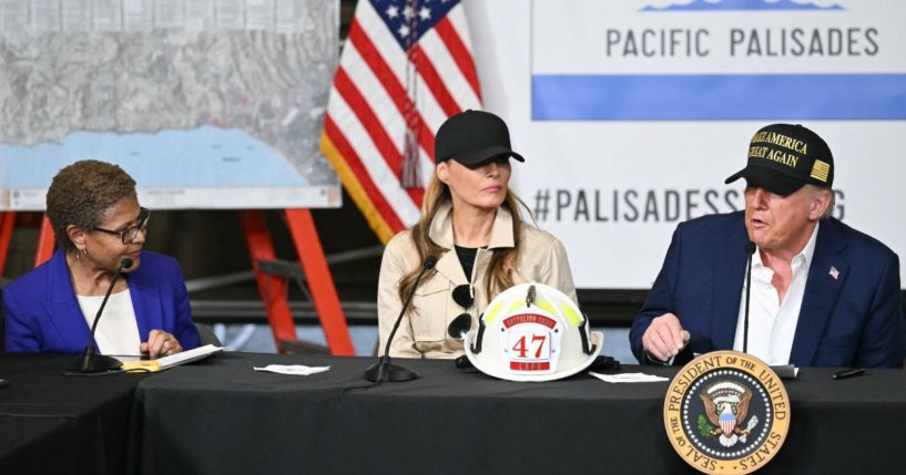 Los Angeles Mayor Karen Bass and First Lady Melania Trump look on as President Donald Trump speaks during a fire emergency briefing at Station 69 in Pacific Palisades, a neighborhood of Los Angeles, California, on January 24, 2025.