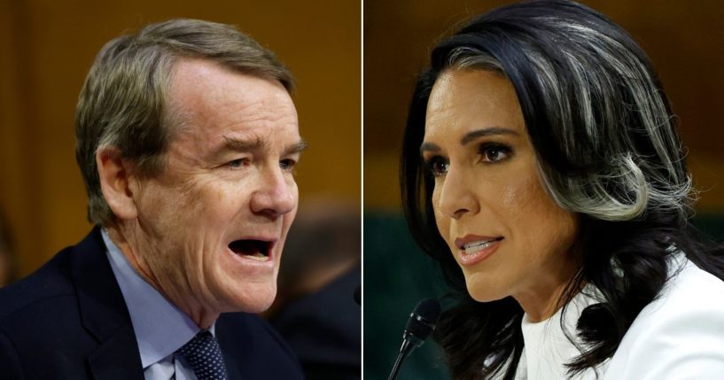 Democratic Sen. Michael Bennet of Colorado, left, questions Tulsi Gabbard, President Donald Trump’s nominee to be Director of National Intelligence, as she testifies during her confirmation hearing before the Senate Intelligence Committee Thursday in Washington, D.C.