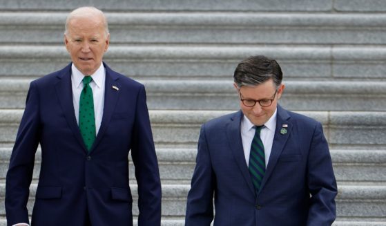 President Joe Biden and Speaker of the House Mike Johnson walk out of the U.S. Capitol on March 15, 2023, in Washington, DC.