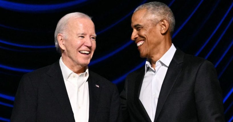 Then-President Joe Biden, left, laughs onstage with former President Barack Obama, right, during a campaign fundraiser in Los Angeles, California, on June 15.