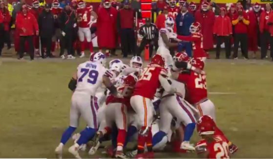 The Buffalo Bills attempt a fourth-down conversion against the Kansas City Chiefs in the AFC Championship Game in Kansas City, Missouri, on Sunday.