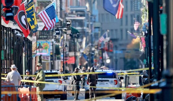 Law enforcement officers from multiple agencies work the scene on Bourbon Street after at least 15 people were killed when a person drove into the crowd in the early morning hours of New Year's Day Wednesday on Bourbon Street in New Orleans, Louisiana. Dozens more were injured after a suspect in a rented pickup truck allegedly drove around barricades and through a crowd of New Year's revelers.